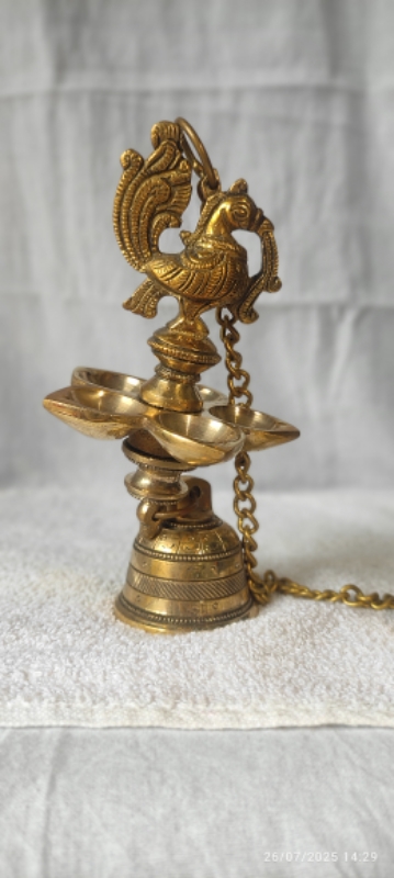 Hanging peacock bell diya pair Hanging peacock bell diya pair